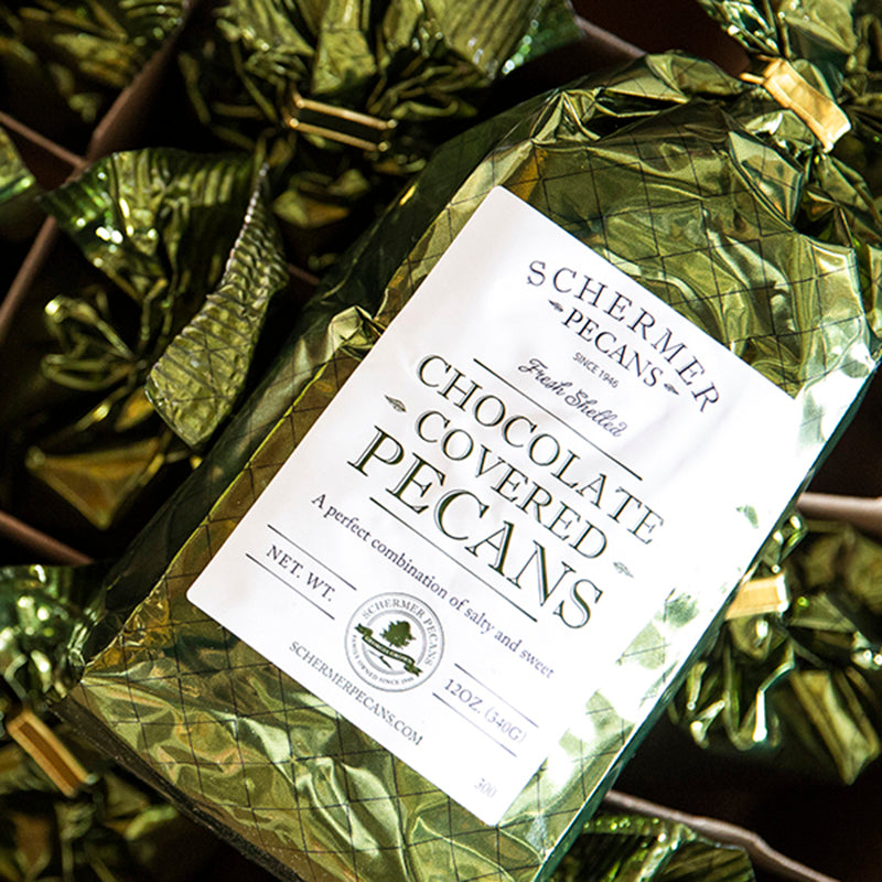 Photo of our green foil gift bag and a case of pecans. Great for fundraising. 